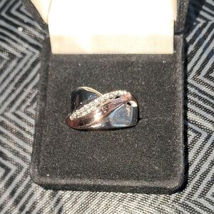 Silver and Rose Gold Swirl Ring With Diamonds